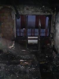FOTO: Hasiči zveřejnili podrobnosti k požáru penzionu v centru Slaného